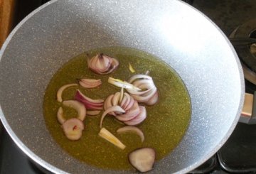 Piovra E Carciofi In Padella preparazione 0