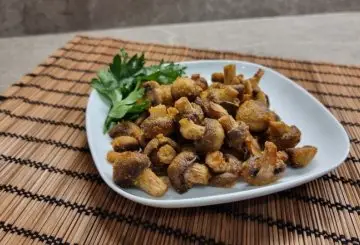 FUNGHI CHAMPIGNON IMPANATI IN FRIGGITRICE AD ARIA