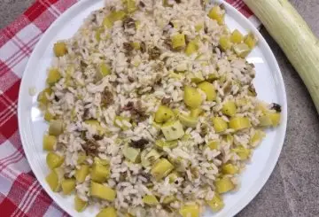 RISOTTO CON ZUCCHINE TROMBETTA E OLIVE TAGGIASCHE