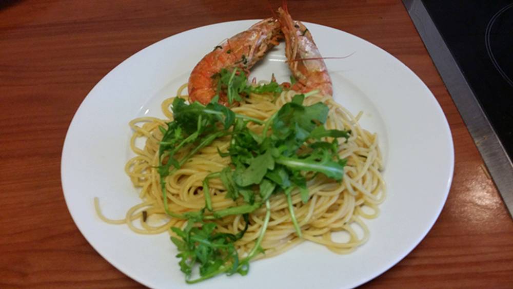 Spaghettini con Gamberoni e Rucola