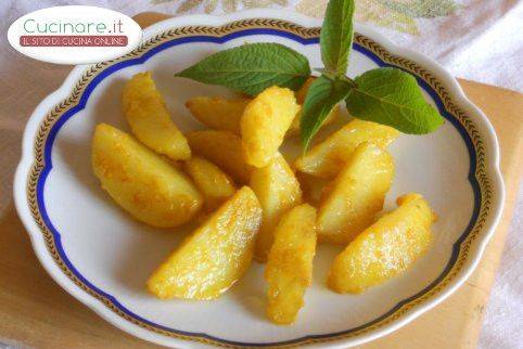 Patate rosse cotte in forno e aromatizzate alla Curcuma