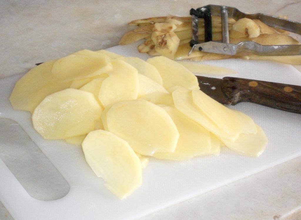 Baccalà gratinato al forno con Patate e Origano preparazione 0
