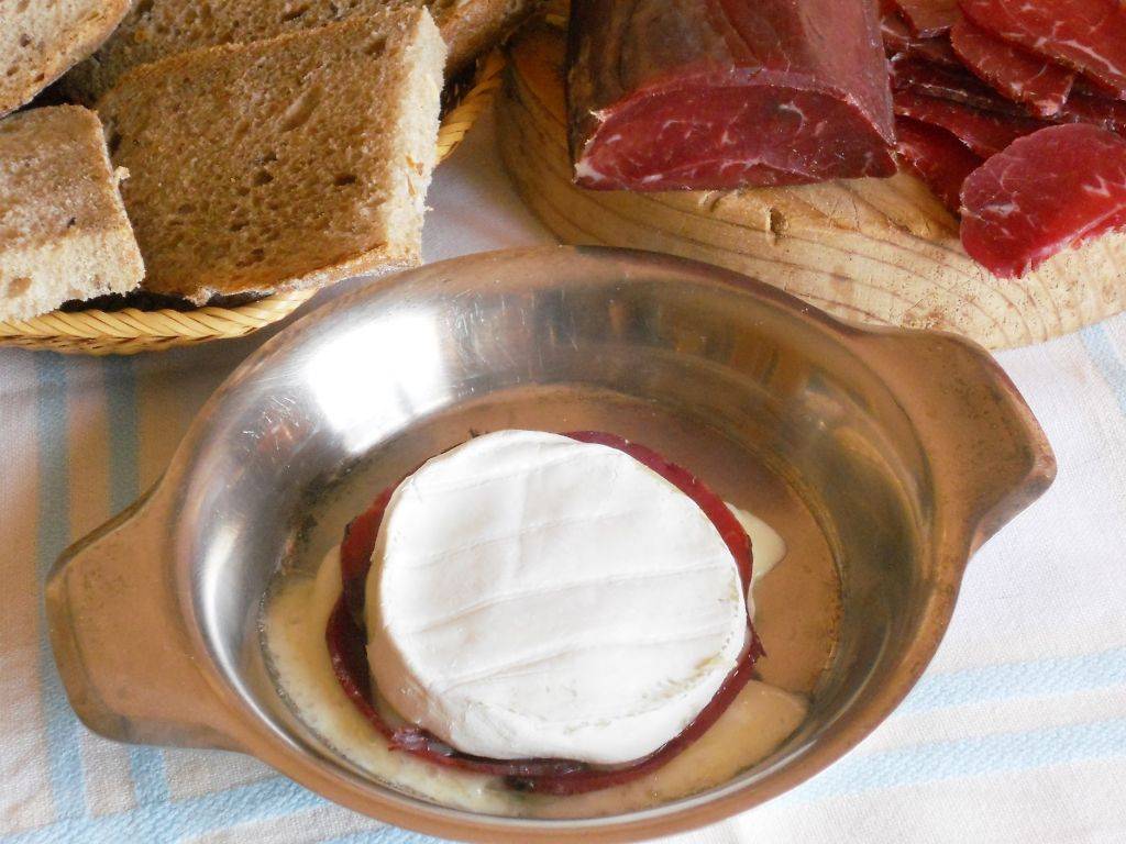 Tomini del Boscaiolo al forno farciti con Slinzega valtellinese preparazione 5