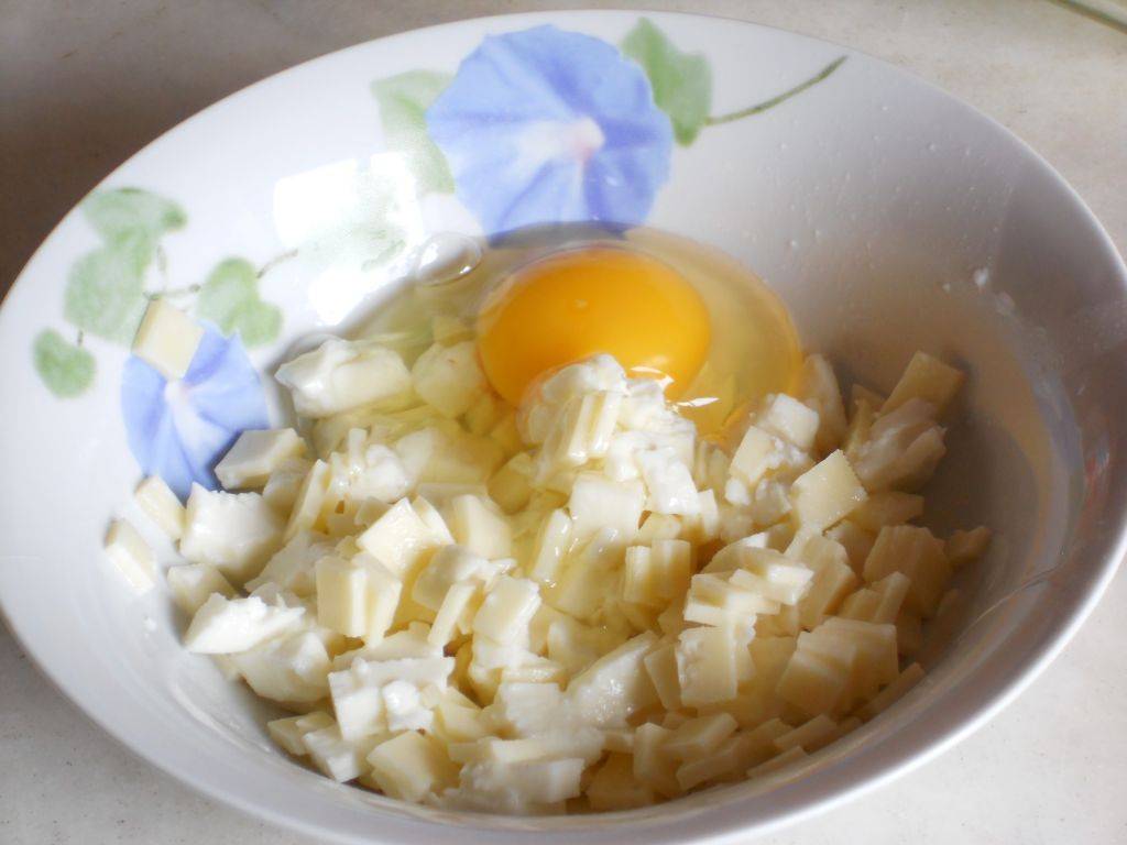 Zucchine ai tre Formaggi gratinate con Pane Nero ai Cereali preparazione 5